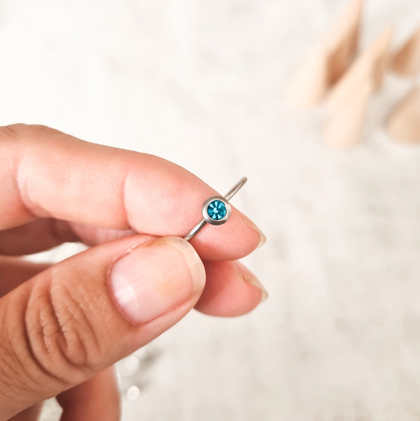 March cubic zirconia coloured birthstone ring made from stainless steel. The gemstone represents the month you were born in.