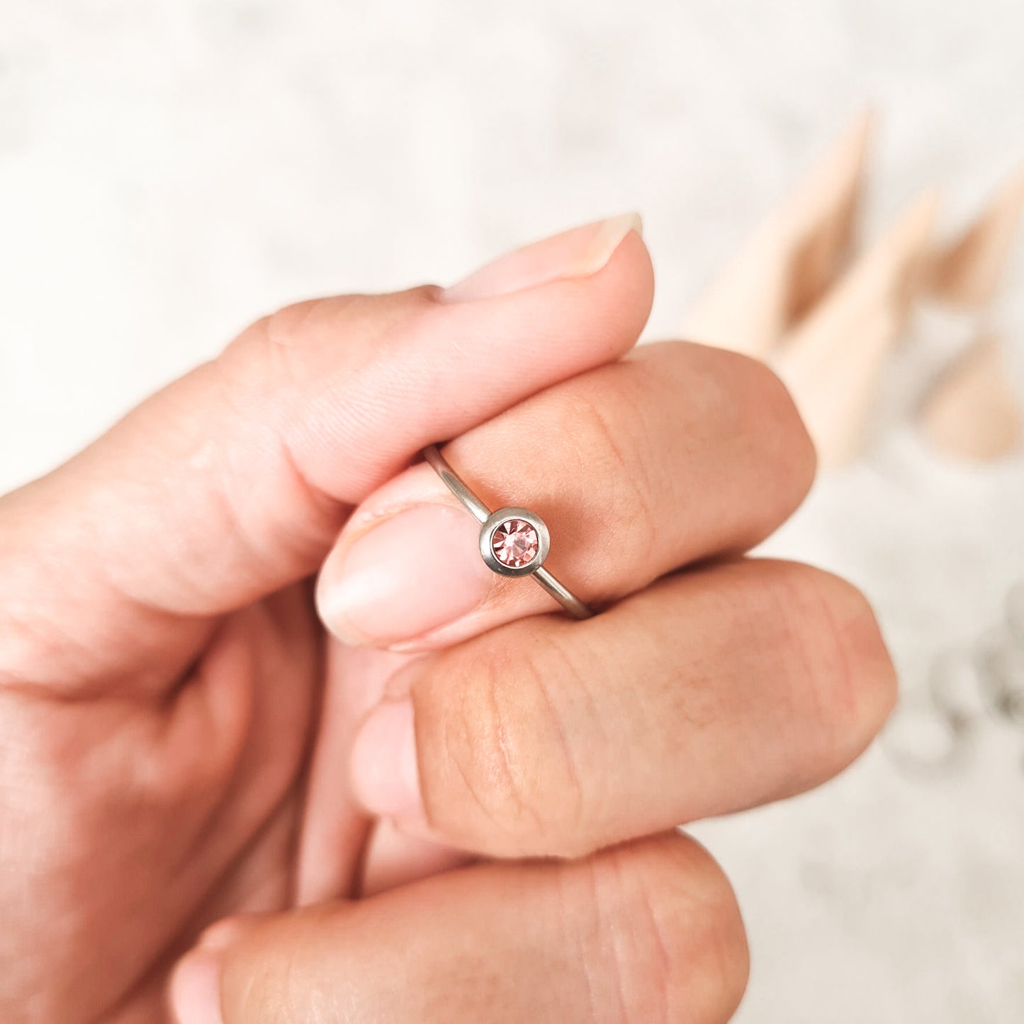 October cubic zirconia coloured birthstone ring made from stainless steel. The gemstone represents the month you were born in.