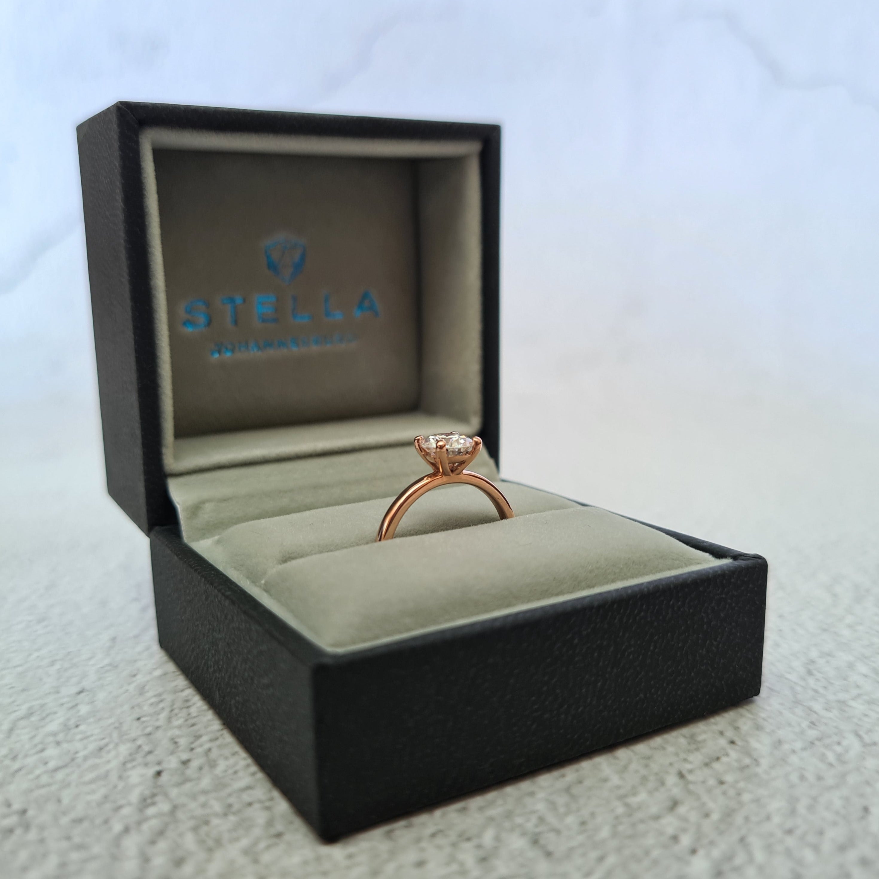 Minimalist Round Solitaire Moissanite Ring