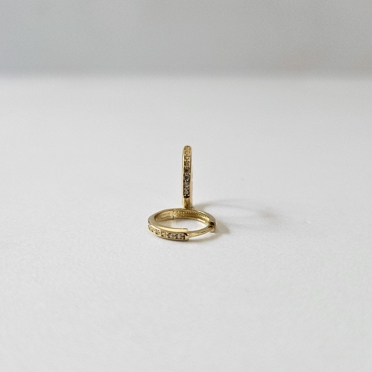 9k Solid Gold CZ Huggies