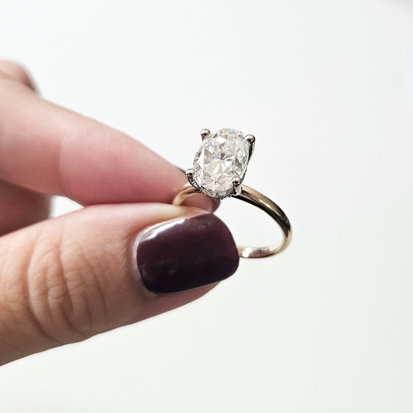 Classic Hidden Halo Oval Solitaire Ring