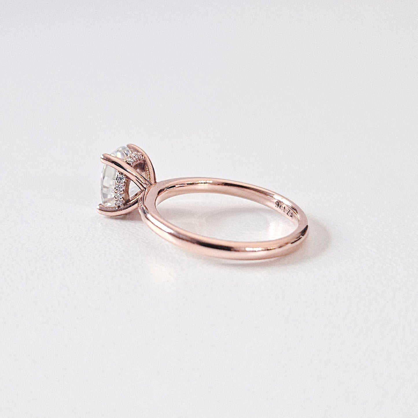 Classic Hidden Halo Oval Solitaire Ring