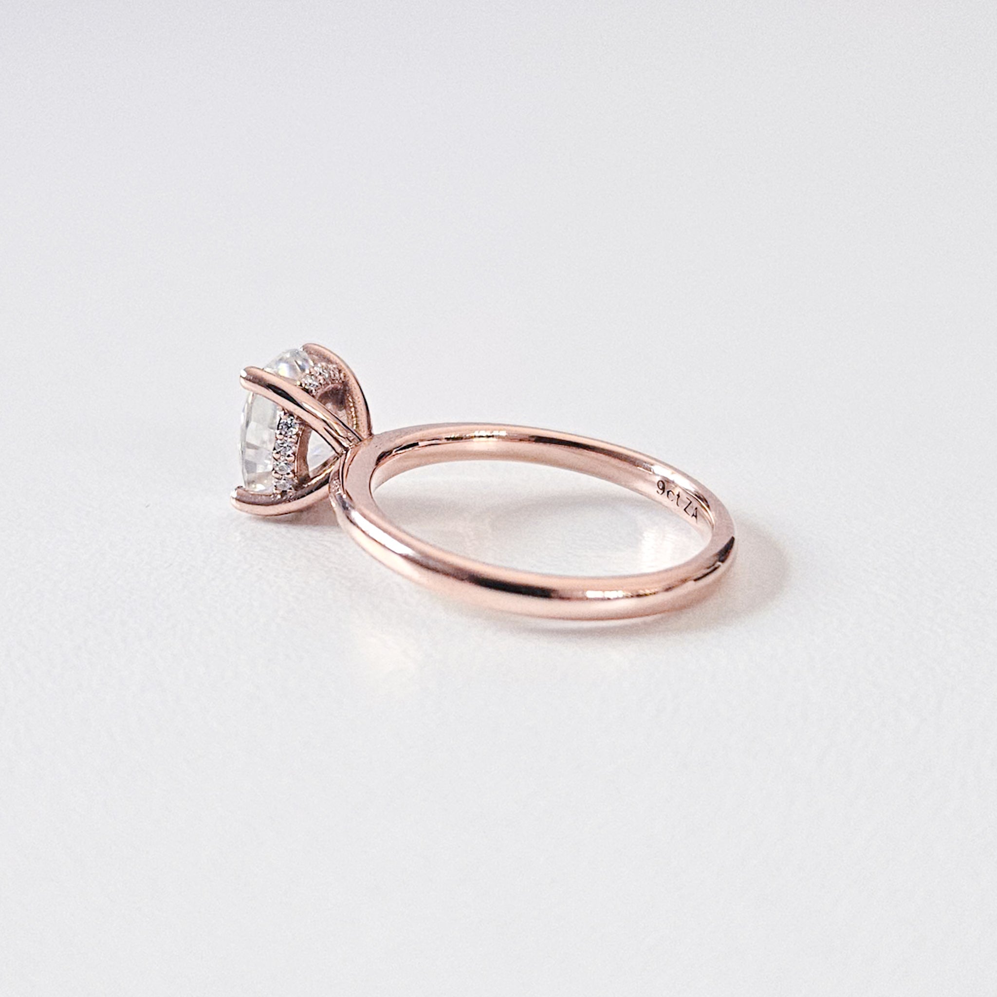 Classic Hidden Halo Oval Solitaire Ring