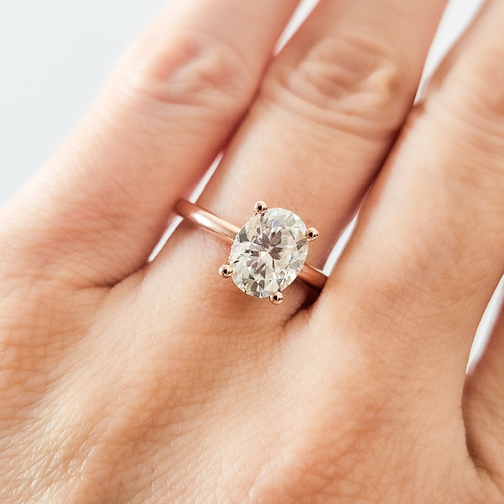 Classic Hidden Halo Oval Solitaire Ring