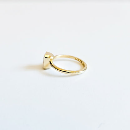 Minimalist Bezel Set Emerald Cut Solitaire Ring