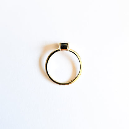 Minimalist Bezel Set Emerald Cut Solitaire Ring