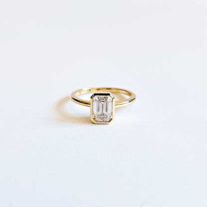 Minimalist Bezel Set Emerald Cut Solitaire Ring