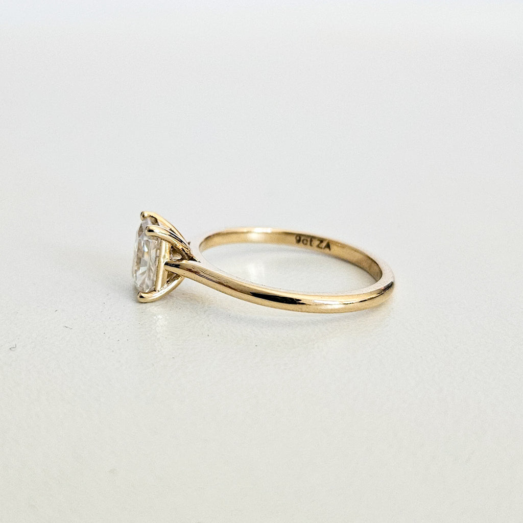 Minimalist Radiant Cut Solitaire Ring