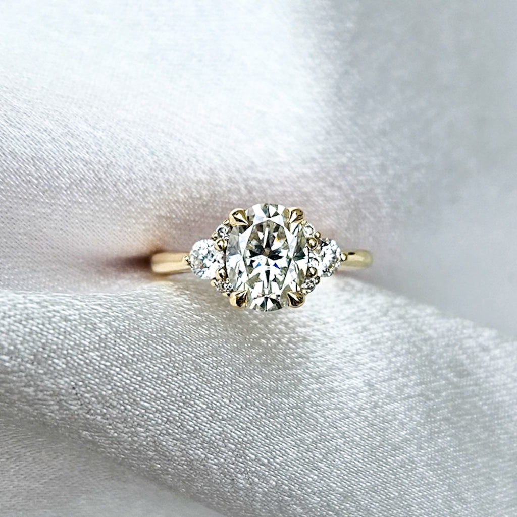 Oval and Round Cluster Ring