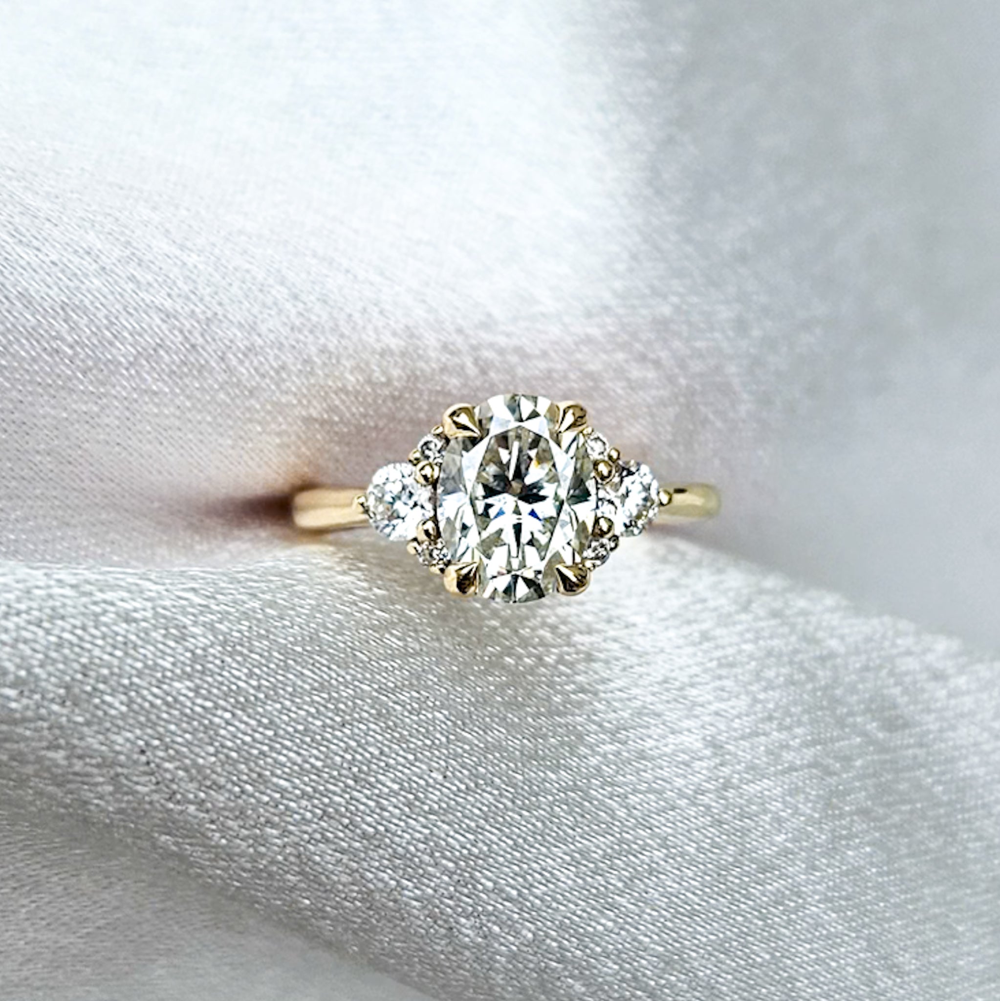 Oval and Round Cluster Ring