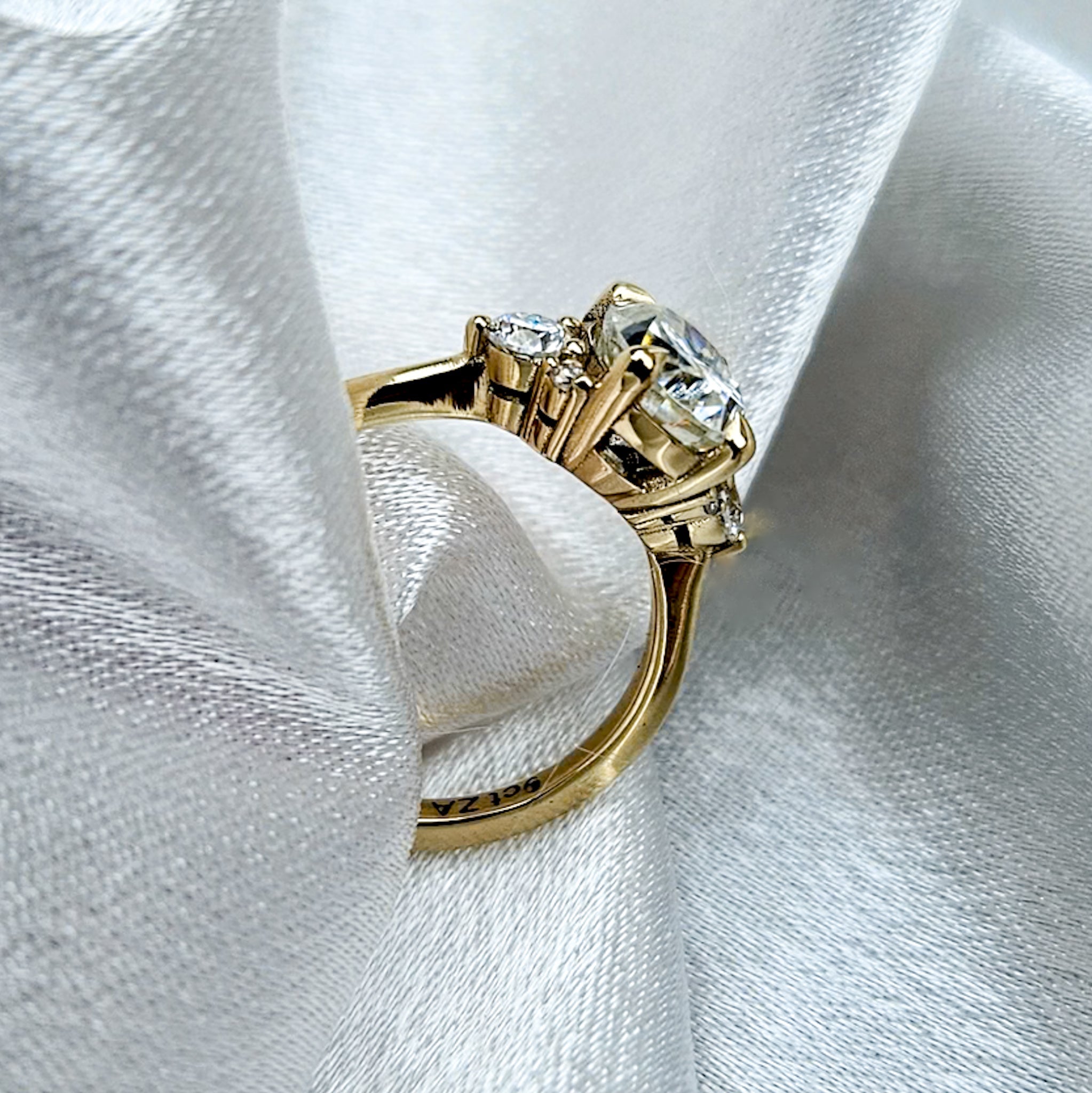 Oval and Round Cluster Ring