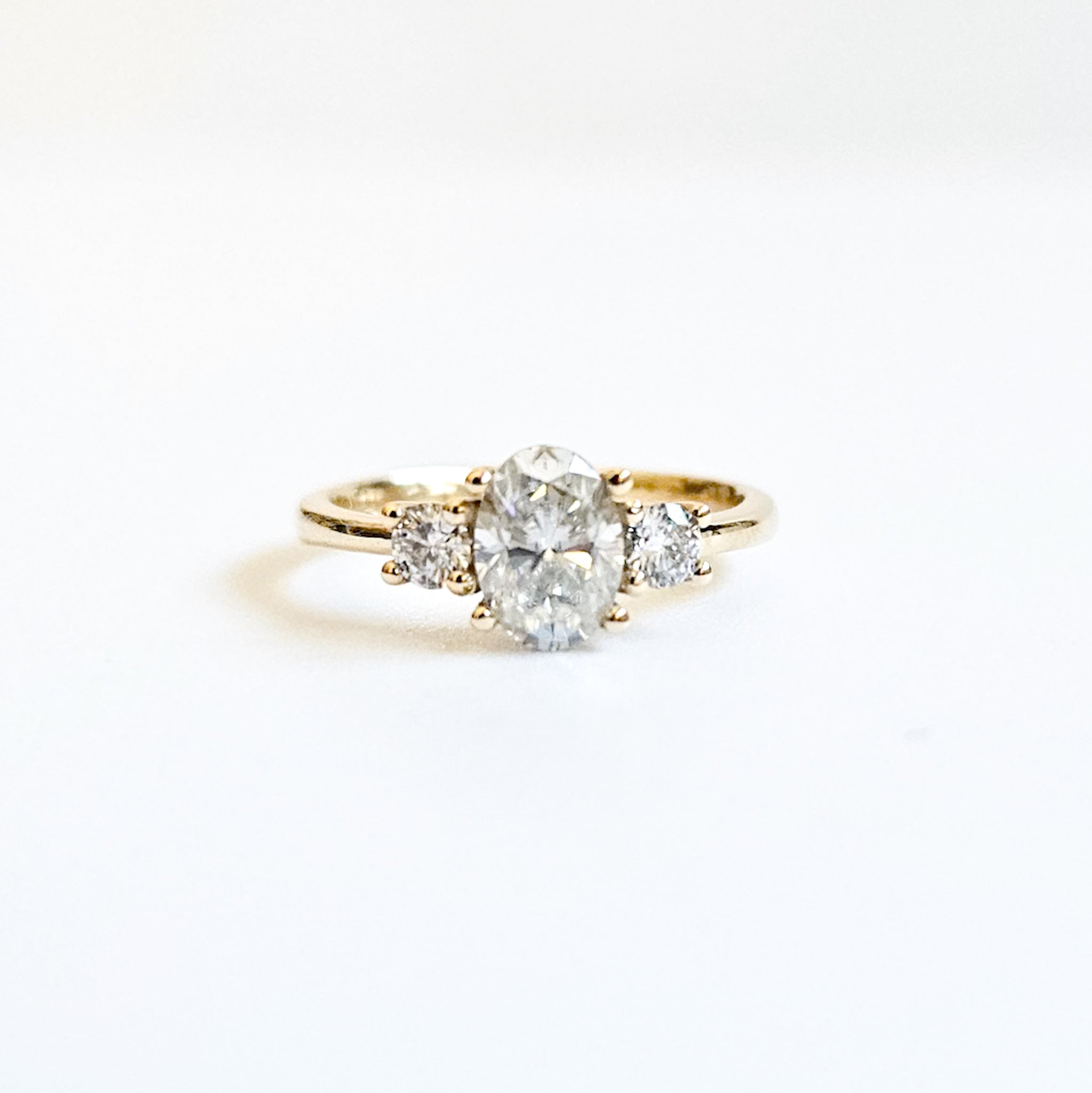 Three Stone Round and Oval Ring