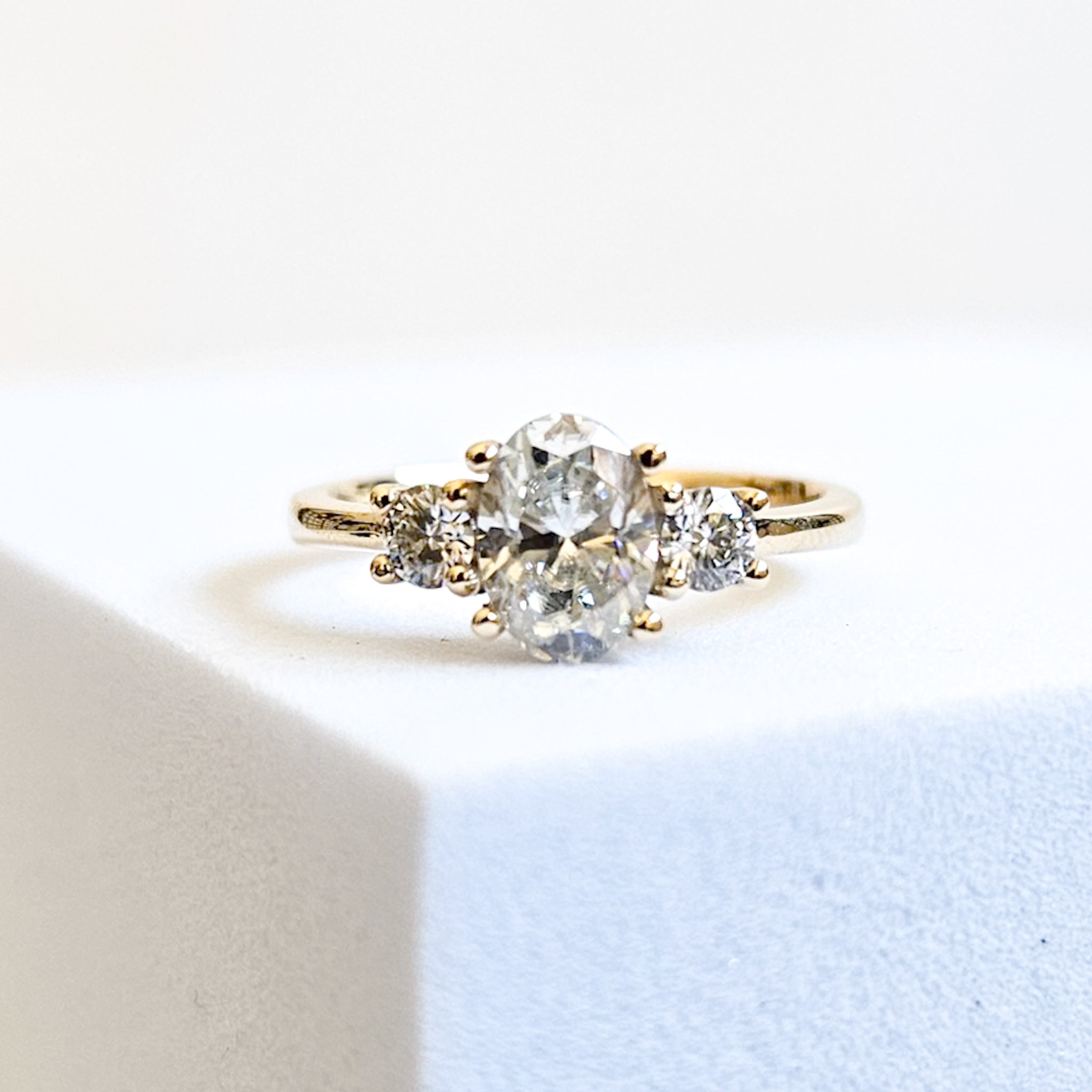 Three Stone Round and Oval Ring