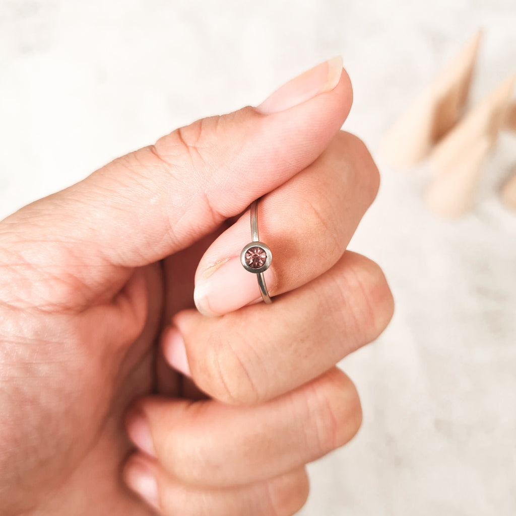 June cubic zirconia coloured birthstone ring made from stainless steel. The gemstone represents the month you were born in.