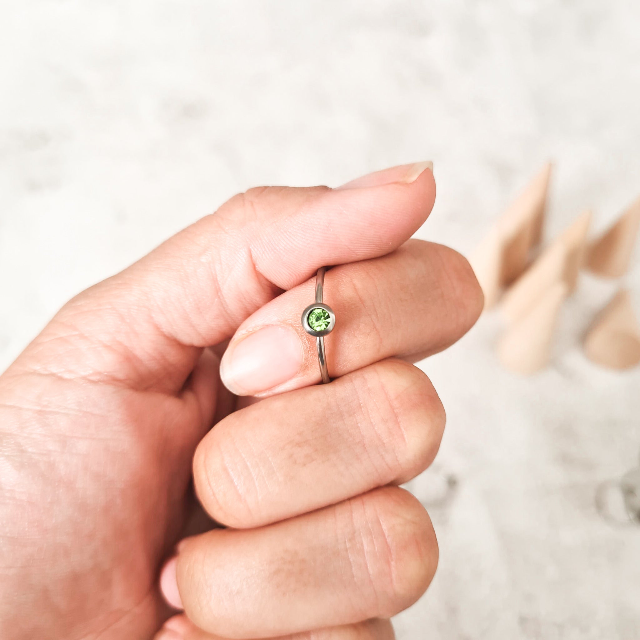 August cubic zirconia coloured birthstone ring made from stainless steel. The gemstone represents the month you were born in.