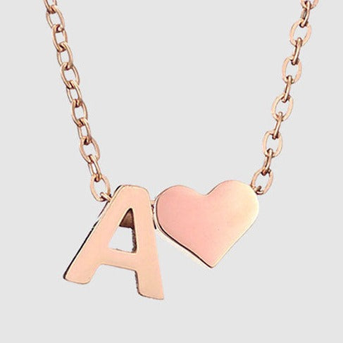 Letter A Stainless steel pure rose gold plated minimalist monogram and heart charm necklace.