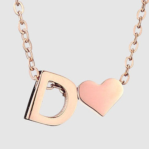Letter D Stainless steel pure rose gold plated minimalist monogram and heart charm necklace.