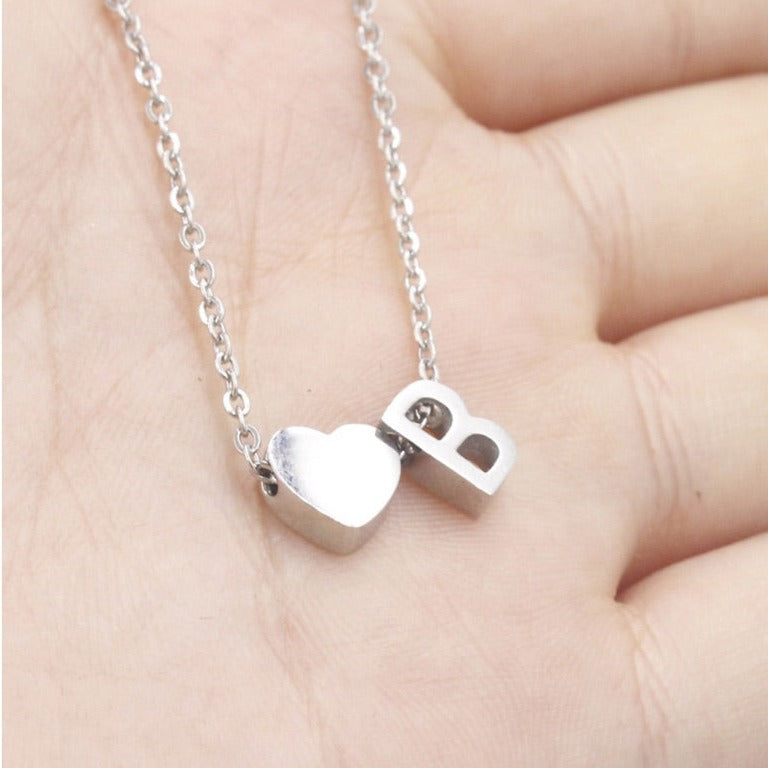 Letter B Stainless steel silver minimalist monogram and heart charm necklace.