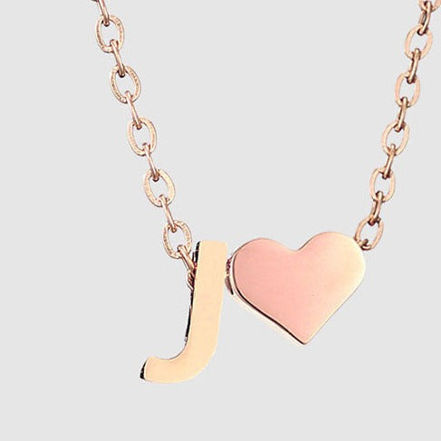Letter J Stainless steel pure rose gold plated minimalist monogram and heart charm necklace.