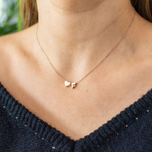 Stainless steel pure rose gold plated minimalist monogram and heart charm necklace.