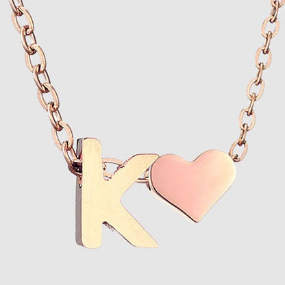 Letter K Stainless steel pure rose gold plated minimalist monogram and heart charm necklace.