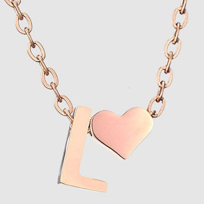 Letter L Stainless steel pure rose gold plated minimalist monogram and heart charm necklace.