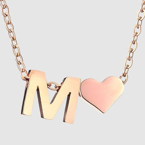 Letter M Stainless steel pure rose gold plated minimalist monogram and heart charm necklace.