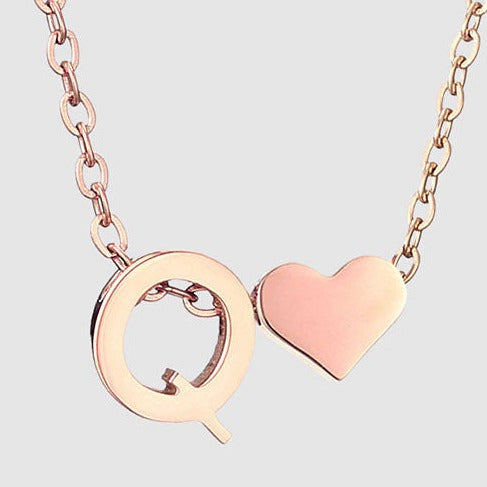 Letter Q Stainless steel pure rose gold plated minimalist monogram and heart charm necklace.